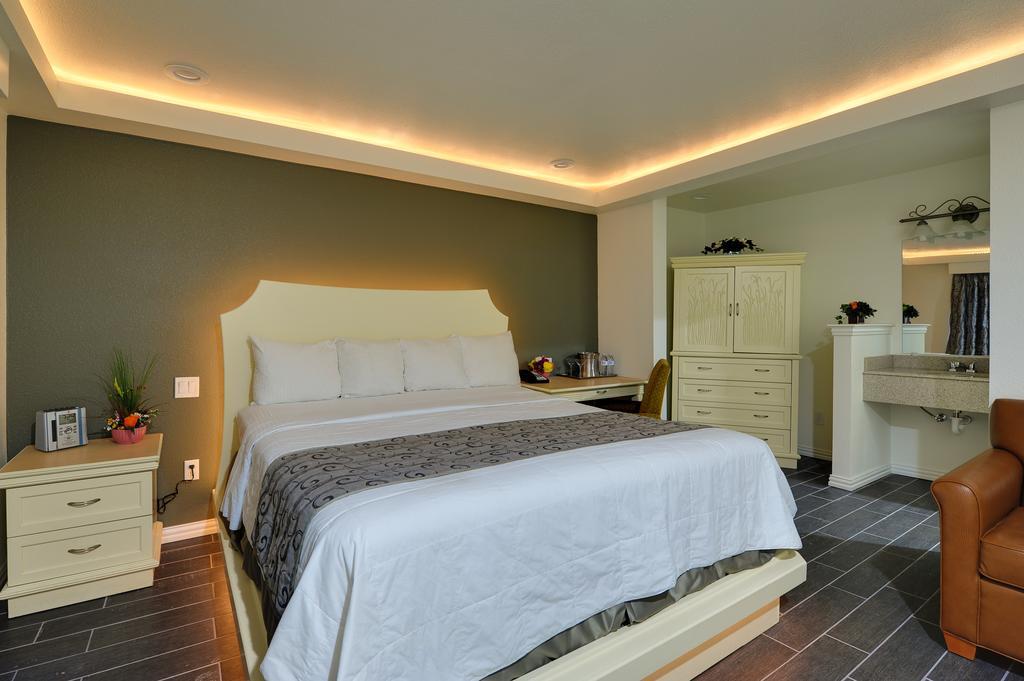 Romantic Inn & Suites Ντάλλας Δωμάτιο φωτογραφία
